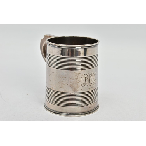 43 - A GEORGE III SILVER CHRISTENING MUG OF TAPERED CYLINDRICAL FORM WITH REEDED BANDS, engraved initials... 