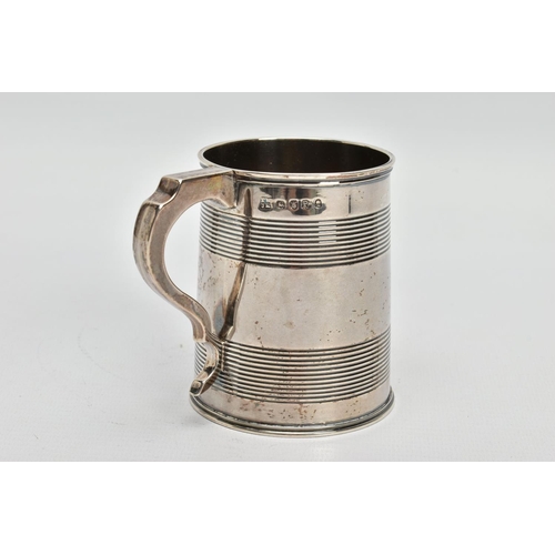 43 - A GEORGE III SILVER CHRISTENING MUG OF TAPERED CYLINDRICAL FORM WITH REEDED BANDS, engraved initials... 