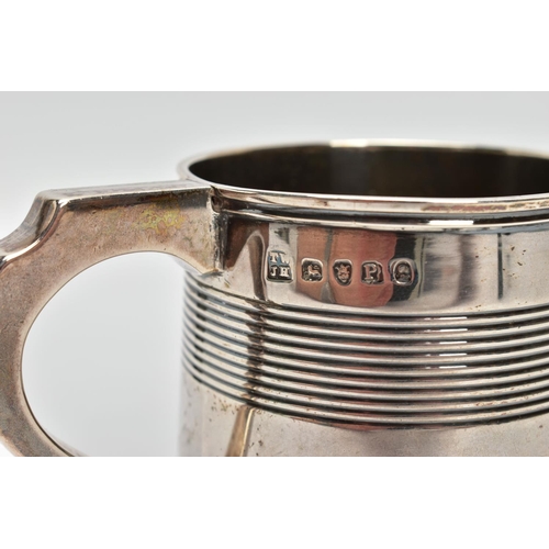 43 - A GEORGE III SILVER CHRISTENING MUG OF TAPERED CYLINDRICAL FORM WITH REEDED BANDS, engraved initials... 