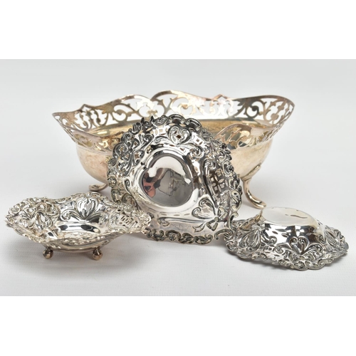 44 - A GEORGE V SILVER OVAL DISH, the foliate pierced rim above a plain bowl, on four cabriole legs with ... 