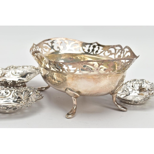 44 - A GEORGE V SILVER OVAL DISH, the foliate pierced rim above a plain bowl, on four cabriole legs with ... 