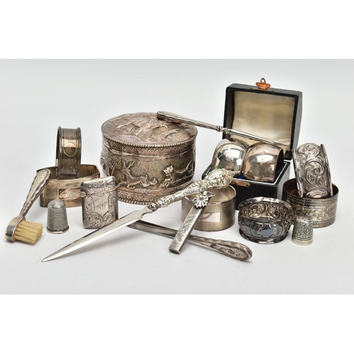 45 - A GROUP LOT OF SILVER AND WHITE METAL TO INCLUDE EIGHT ASSORTED SILVER NAPKIN RINGS, two of which ar... 