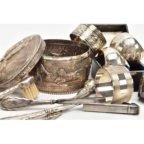 45 - A GROUP LOT OF SILVER AND WHITE METAL TO INCLUDE EIGHT ASSORTED SILVER NAPKIN RINGS, two of which ar... 