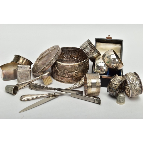 45 - A GROUP LOT OF SILVER AND WHITE METAL TO INCLUDE EIGHT ASSORTED SILVER NAPKIN RINGS, two of which ar... 