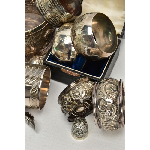 45 - A GROUP LOT OF SILVER AND WHITE METAL TO INCLUDE EIGHT ASSORTED SILVER NAPKIN RINGS, two of which ar... 