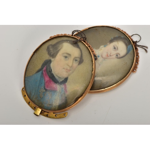 5 - TWO GOLD GEORGIAN PORTRAIT MINIATURE CLASPS, hand painted on ivory, one of a gentleman in a blue wai... 