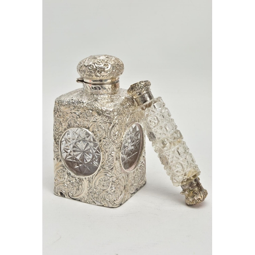 52 - A LATE VICTORIAN SILVER MOUNTED GLASS SCENT BOTTLE OF SQUARE OUTLINE, hinged circular cover with vac... 