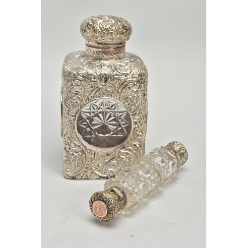 52 - A LATE VICTORIAN SILVER MOUNTED GLASS SCENT BOTTLE OF SQUARE OUTLINE, hinged circular cover with vac... 