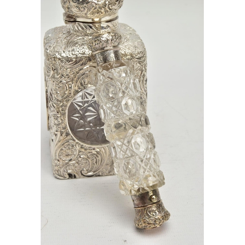 52 - A LATE VICTORIAN SILVER MOUNTED GLASS SCENT BOTTLE OF SQUARE OUTLINE, hinged circular cover with vac... 