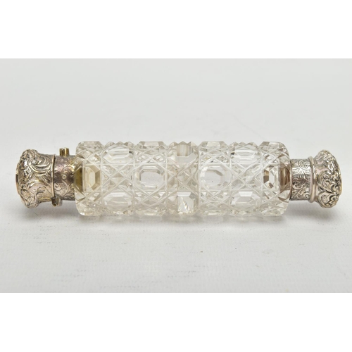 52 - A LATE VICTORIAN SILVER MOUNTED GLASS SCENT BOTTLE OF SQUARE OUTLINE, hinged circular cover with vac... 