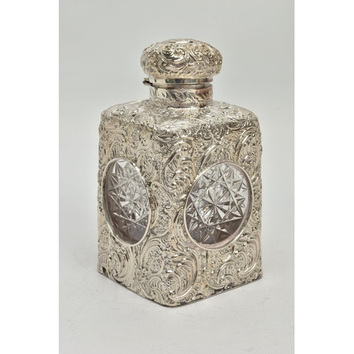 52 - A LATE VICTORIAN SILVER MOUNTED GLASS SCENT BOTTLE OF SQUARE OUTLINE, hinged circular cover with vac... 