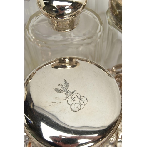 54 - A PAIR OF LATE VICTORIAN SILVER HEART SHAPED BONBON DISHES AND SIX SILVER TOPPED GLASS TOILET JARS, ... 