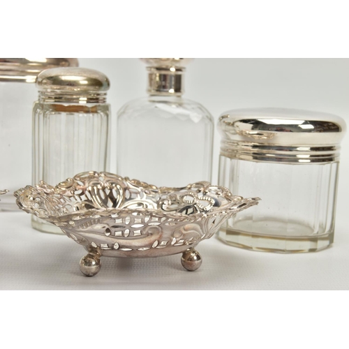 54 - A PAIR OF LATE VICTORIAN SILVER HEART SHAPED BONBON DISHES AND SIX SILVER TOPPED GLASS TOILET JARS, ... 