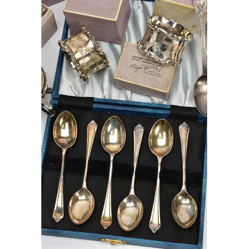 58 - A SET OF SIX INDIVIDUALLY BOXED GEORGE V SILVER NAPKIN RINGS AND A SMALL QUANTITY OF OTHER CASED AND... 