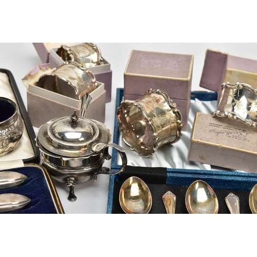 58 - A SET OF SIX INDIVIDUALLY BOXED GEORGE V SILVER NAPKIN RINGS AND A SMALL QUANTITY OF OTHER CASED AND... 