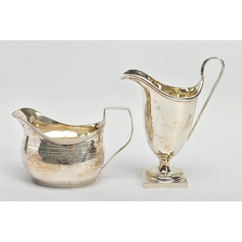 62 - TWO SILVER HELMET SHAPED CREAM JUGS, comprising a George III example with bright cut decoration, rec... 