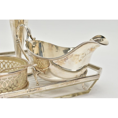 64 - A PARCEL OF SILVER AND SILVER MOUNTED ITEMS, comprising a George V sauce boat, on three cabriole leg... 