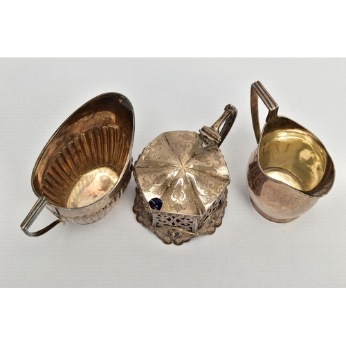 66 - A VICTORIAN PIERCED SILVER MUSTARD OF HEXAGONAL FORM AND TWO VICTORIAN MILK / CREAM JUGS, the mustar... 