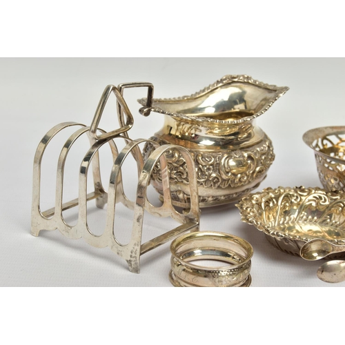 83 - A PARCEL OF VICTORIAN AND 20TH CENTURY SILVER, comprising an Edwardian oval bon bon basket with swin... 