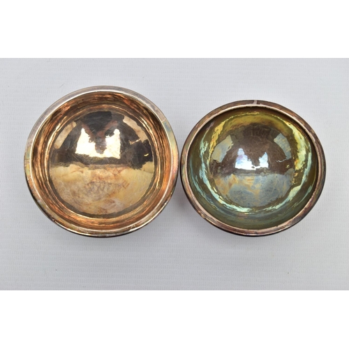 86 - TWO ELIZABETH II GEORGE HENRY HART FOR THE GUILD OF HANDICRAFT SILVER BOWLS, the first a lightly pla... 