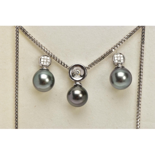 9 - A MODERN TAHITIAN PEARL AND DIAMOND PENDANT AND EARRING SET, pendant designed as a single articulate... 