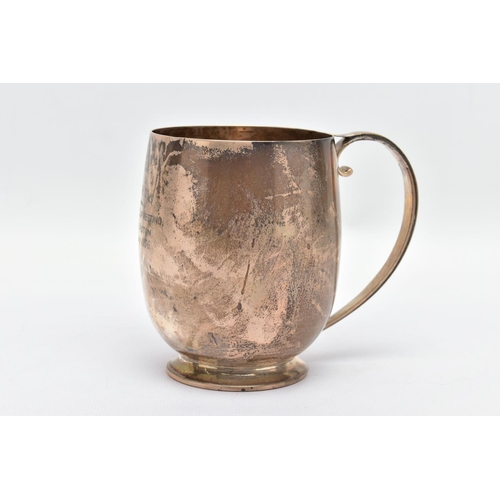 91 - AN ELIZABETH II SILVER MUG, a bell shaped mug with a scrolled handle and skirted foot, engraved 'M.C... 