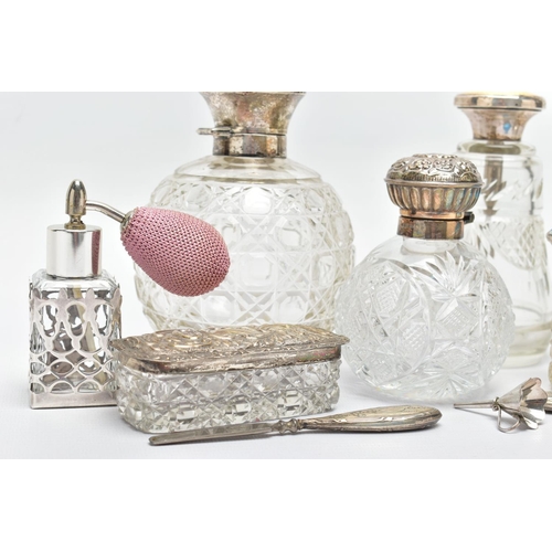 94 - A PARCEL OF SILVER MOUNTED SCENT BOTTLES, TOILET JARS, BOX AND MANICURE ACCESSORIES, including a Geo... 