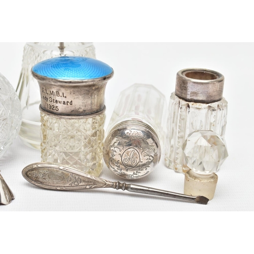 94 - A PARCEL OF SILVER MOUNTED SCENT BOTTLES, TOILET JARS, BOX AND MANICURE ACCESSORIES, including a Geo... 