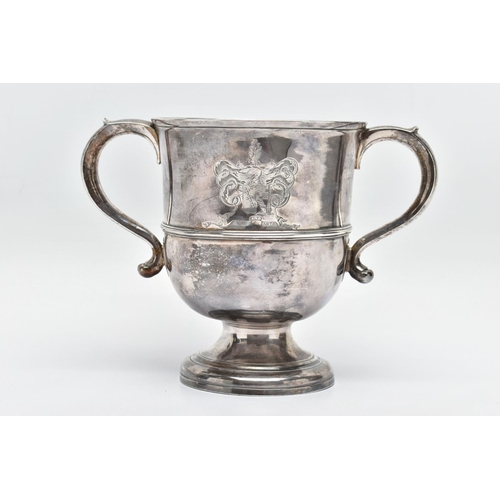 95 - A GEORGE II SILVER TWIN HANDLED CUP, with S scroll handles, the front and back engraved with differe... 