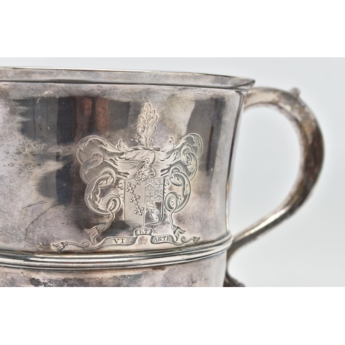 95 - A GEORGE II SILVER TWIN HANDLED CUP, with S scroll handles, the front and back engraved with differe... 