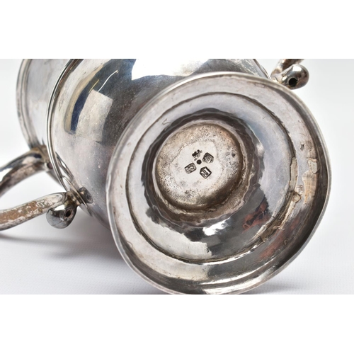 95 - A GEORGE II SILVER TWIN HANDLED CUP, with S scroll handles, the front and back engraved with differe... 