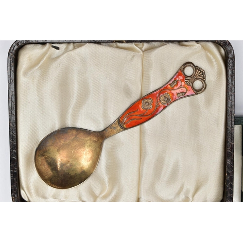 97 - A CASED SET OF SIX GEORGE V SILVER GILT AND HARLEQUIN ENAMEL COFFEE SPOONS, engine turned decoration... 