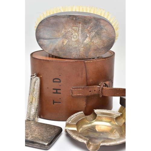 99 - A PARCEL OF SILVER, including a George V 9ct gold mounted amber bakelite cigar holder fitted in a si... 