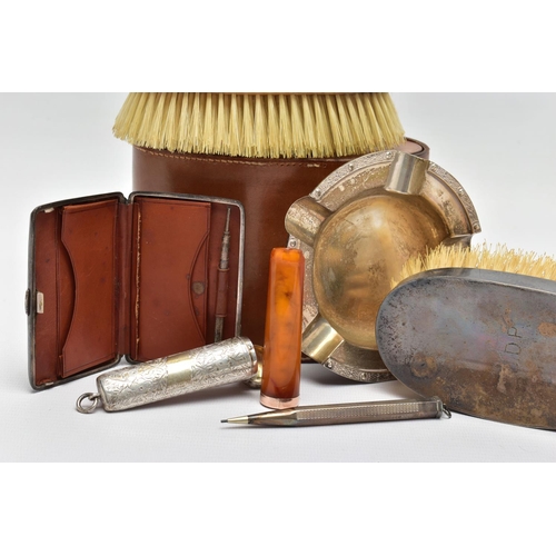 99 - A PARCEL OF SILVER, including a George V 9ct gold mounted amber bakelite cigar holder fitted in a si... 