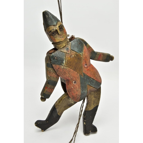 218 - FOLK ART, a 19th century polychrome painted pine Jumping Jack Harlequin toy, carved and decorated to... 