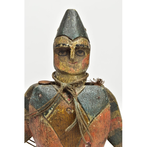 218 - FOLK ART, a 19th century polychrome painted pine Jumping Jack Harlequin toy, carved and decorated to... 