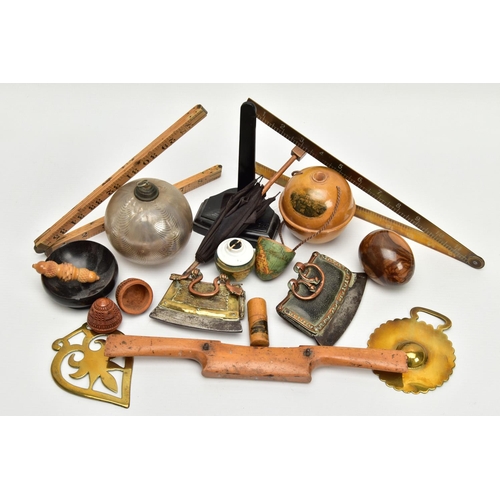 220 - A BOX OF 19TH AND 20TH CENTURY TREEN, METALWARES AND GLASS, including a wooden shaped egg with paper... 