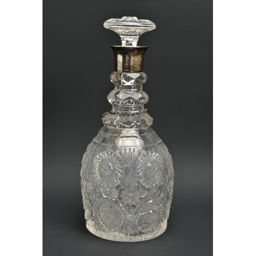 222 - AN EARLY 19TH CENTURY PRUSSIAN SHAPED GLASS  DECANTER AND A GEORGE V GLASS DECANTER, the early 19th ... 