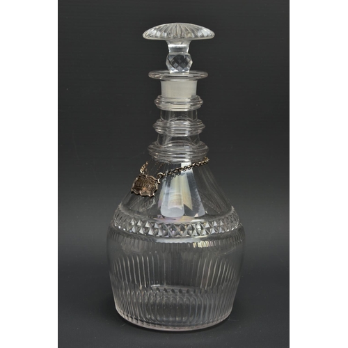 222 - AN EARLY 19TH CENTURY PRUSSIAN SHAPED GLASS  DECANTER AND A GEORGE V GLASS DECANTER, the early 19th ... 