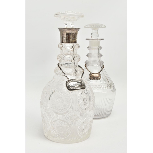 222 - AN EARLY 19TH CENTURY PRUSSIAN SHAPED GLASS  DECANTER AND A GEORGE V GLASS DECANTER, the early 19th ... 