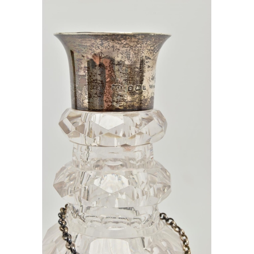 222 - AN EARLY 19TH CENTURY PRUSSIAN SHAPED GLASS  DECANTER AND A GEORGE V GLASS DECANTER, the early 19th ... 