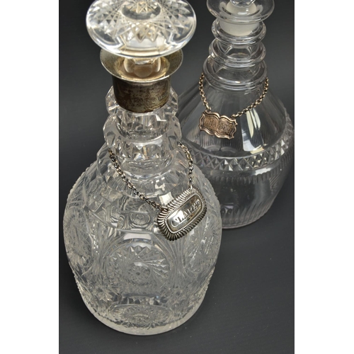 222 - AN EARLY 19TH CENTURY PRUSSIAN SHAPED GLASS  DECANTER AND A GEORGE V GLASS DECANTER, the early 19th ... 