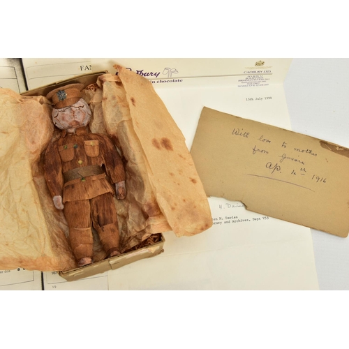 226 - AN EARLY 20TH CENTURY WW1 CHOCOLATE SOLDIER, POSSIBLY BY PASCALLS, CIRCA 1916, the moulded figure dr... 