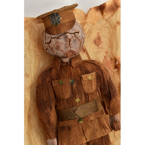 226 - AN EARLY 20TH CENTURY WW1 CHOCOLATE SOLDIER, POSSIBLY BY PASCALLS, CIRCA 1916, the moulded figure dr... 