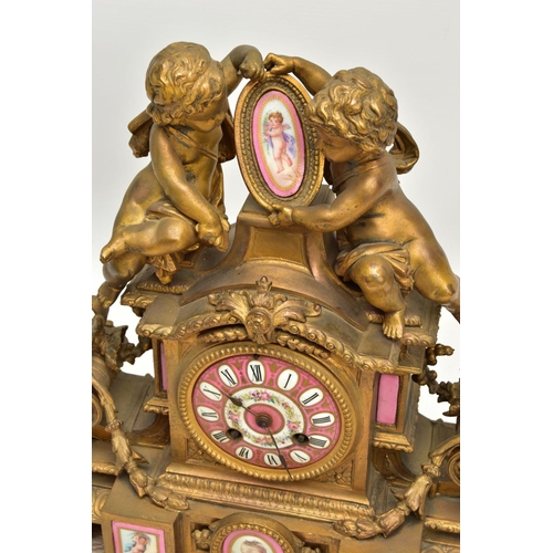 227 - A MID 19TH CENTURY FRENCH GILT METAL AND PORCELAIN MOUNTED FIGURAL MANTEL CLOCK, the case surmounted... 