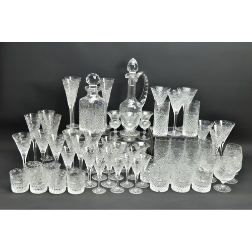 228 - A SUITE OF STUART CRYSTAL BEACONSFIELD PATTERN DRINKING GLASSES AND DECANTERS, comprising a square d... 