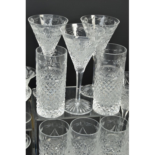 228 - A SUITE OF STUART CRYSTAL BEACONSFIELD PATTERN DRINKING GLASSES AND DECANTERS, comprising a square d... 