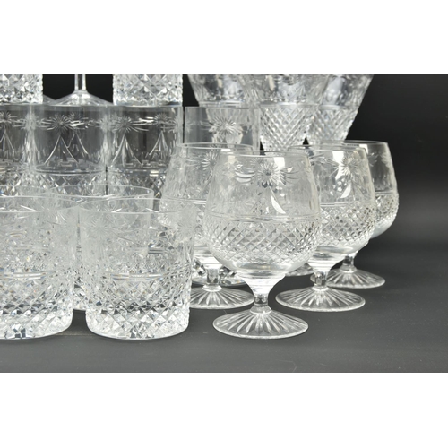 228 - A SUITE OF STUART CRYSTAL BEACONSFIELD PATTERN DRINKING GLASSES AND DECANTERS, comprising a square d... 