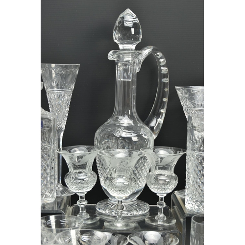 228 - A SUITE OF STUART CRYSTAL BEACONSFIELD PATTERN DRINKING GLASSES AND DECANTERS, comprising a square d... 