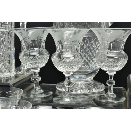 228 - A SUITE OF STUART CRYSTAL BEACONSFIELD PATTERN DRINKING GLASSES AND DECANTERS, comprising a square d... 